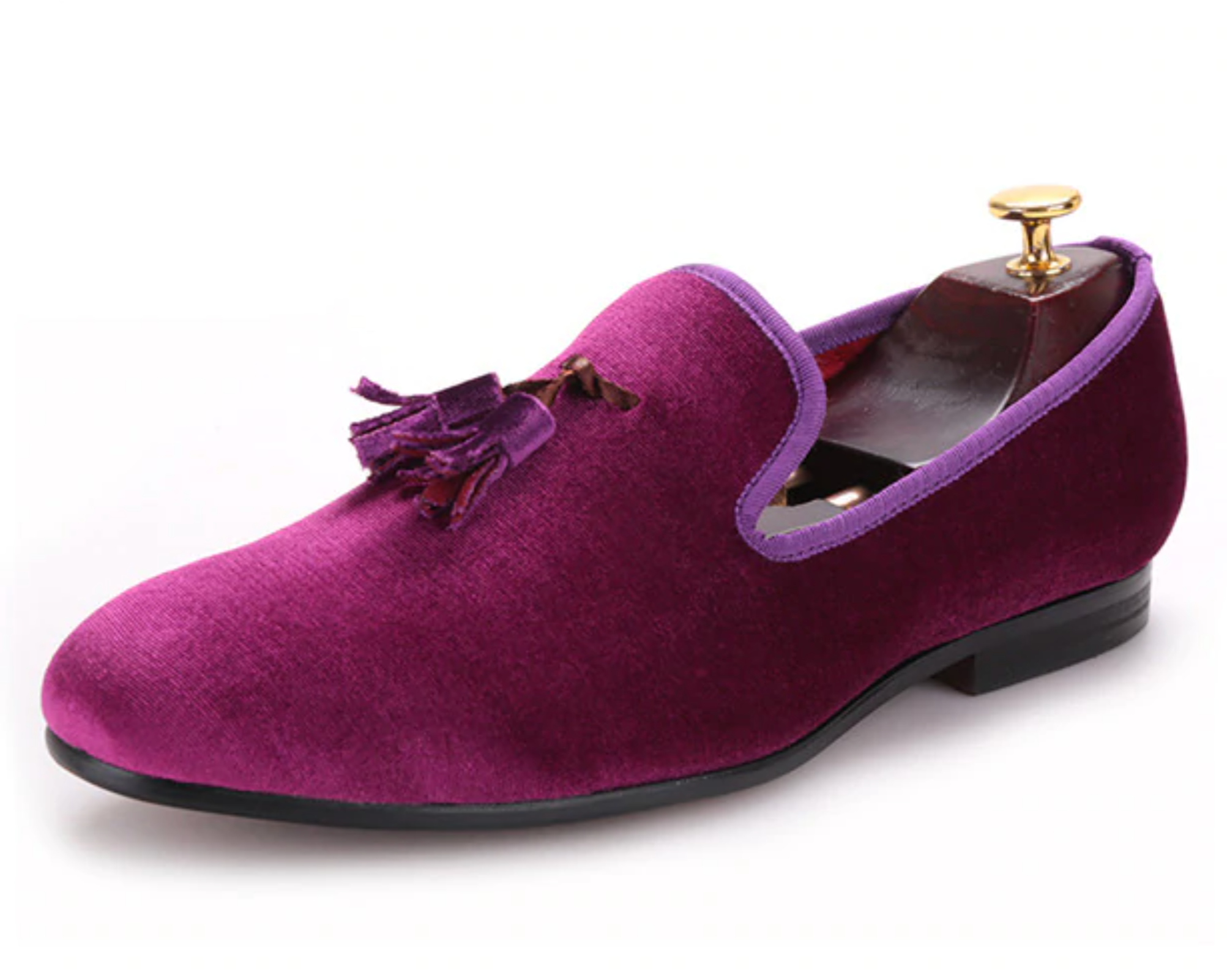 Plush magenta, velvet-look loafers with a quilted red fabric lining.