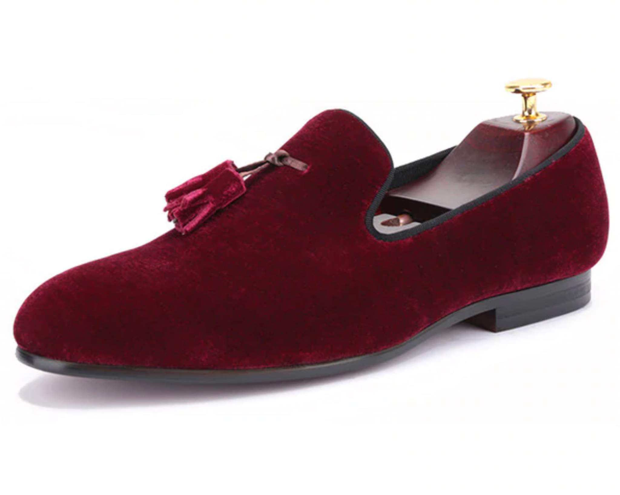 Burgundy velvet-look loafers with a quilted red lining.