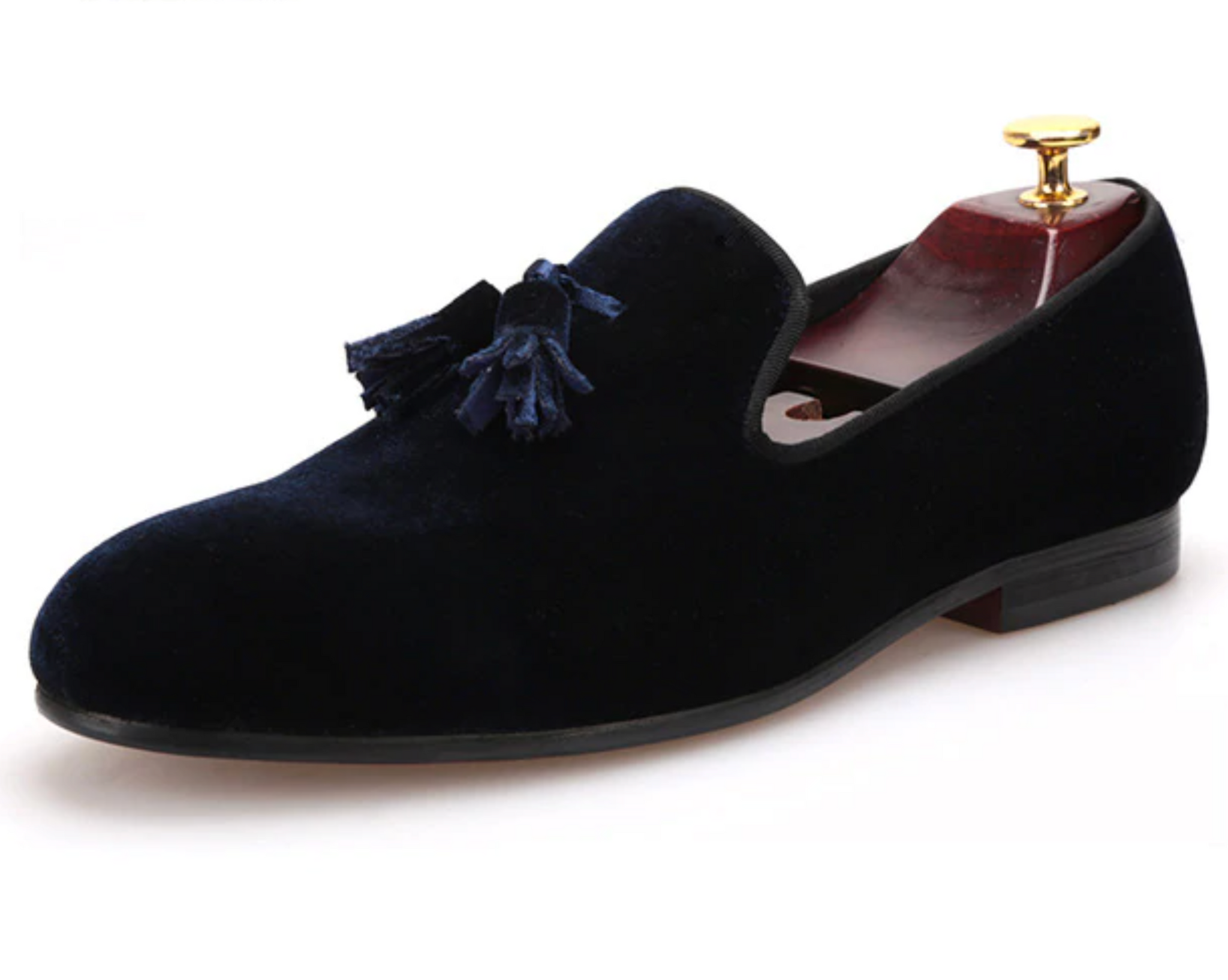 Navy-blue velvet-look tasselled loafers with a plush red quilted lining.