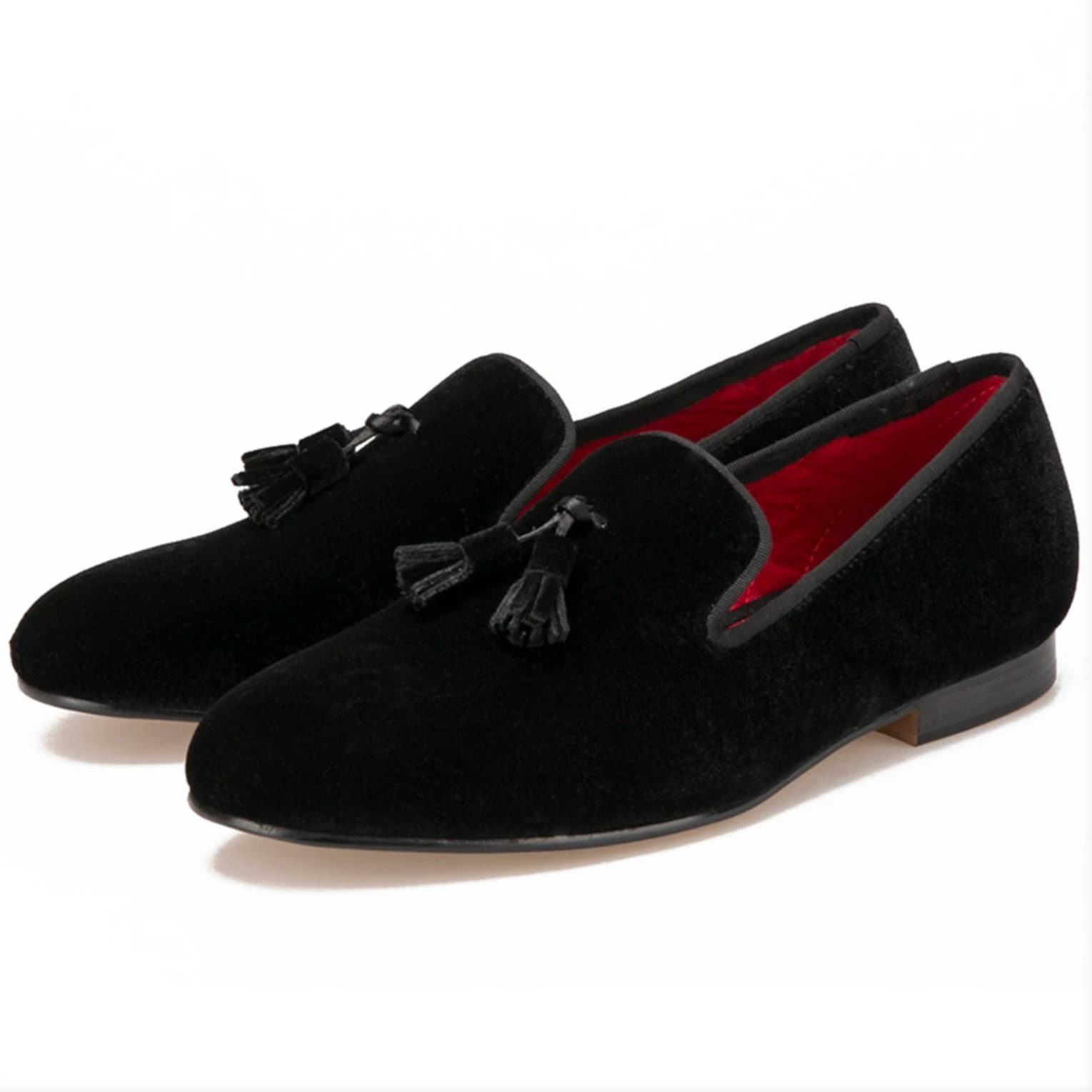 Comfortable black velvet-look loafers with quilted red lining.